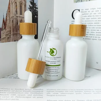 110 Adet Moda 1 OZ Buzlu Beyaz Cam Kozmetik Ambalaj Serum Damlalıklı Şişe Bambu Kapaklı Boş Sıvı Dağıtıcı Şişe CN